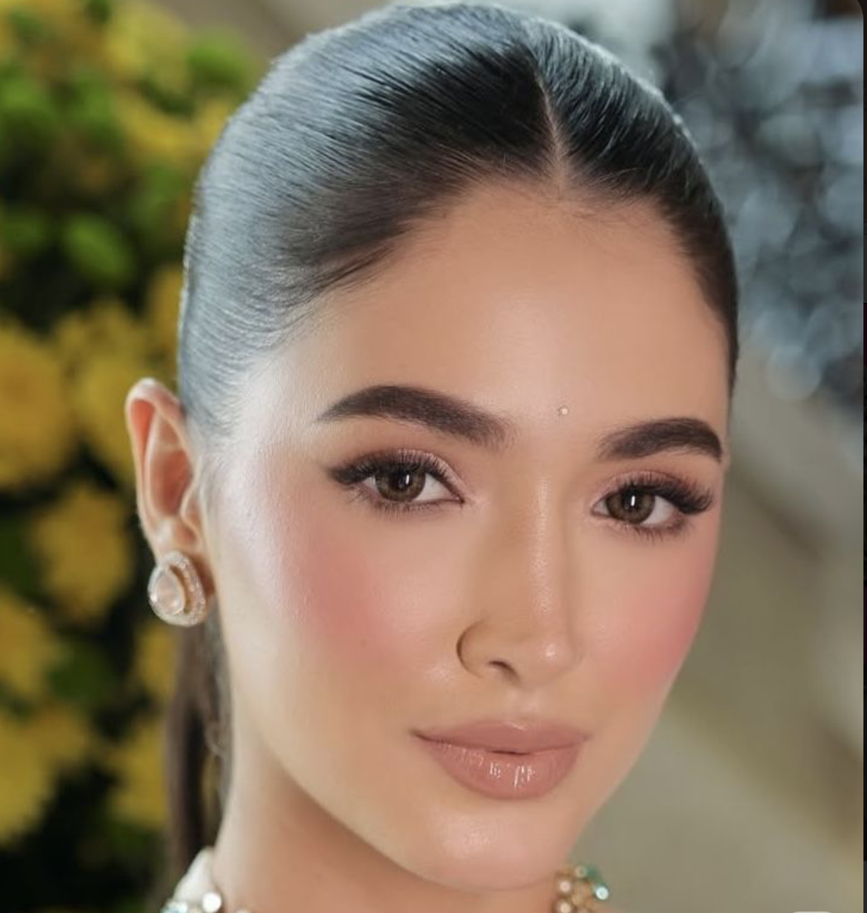Soft glam makeup look with dewy luminous skin and nude lips